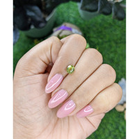 1.11 Ct. Yellowish Green Sapphire from Tanzania Life Style