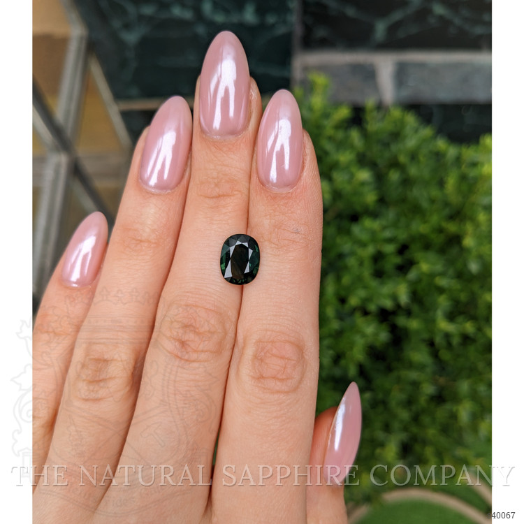 3.44 Ct. Yellowish Green Sapphire from Burma (Myanmar)