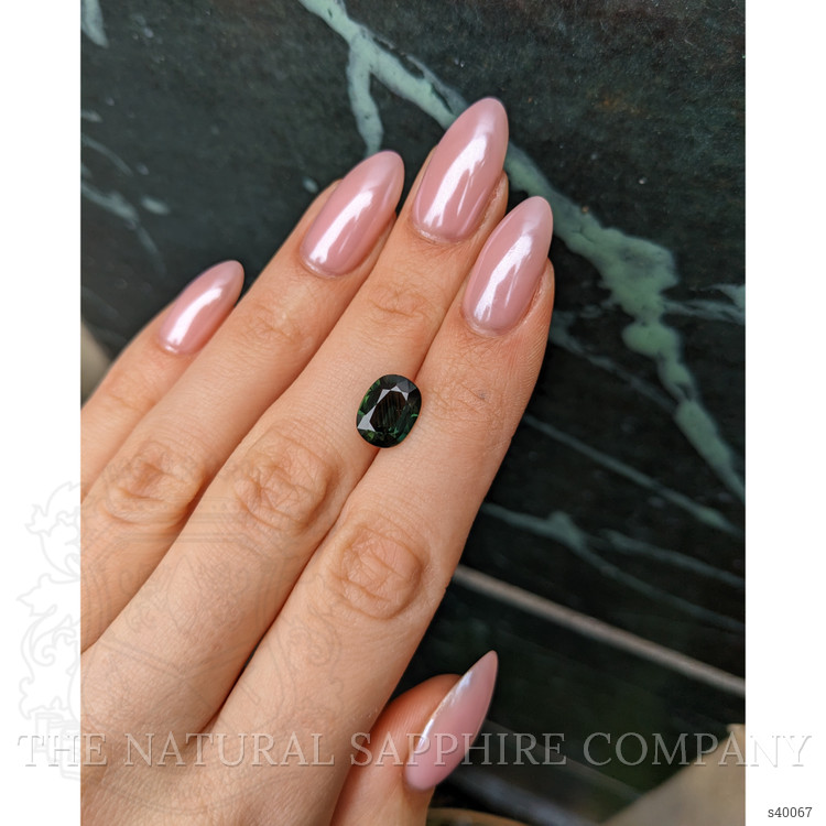 3.44 Ct. Yellowish Green Sapphire from Burma (Myanmar)