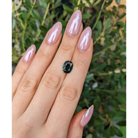 3.44 Ct. Yellowish Green Sapphire from Burma (Myanmar) Life Style