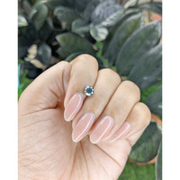 1.08 Ct. Bluish Green Sapphire from Madagascar Life Style
