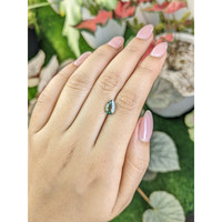 1.56 Ct. Bluish Green Sapphire from Madagascar Life Style