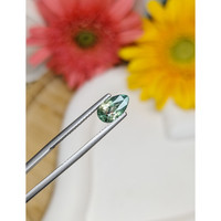 1.56 Ct. Bluish Green Sapphire from Madagascar Life Style