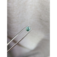 1.12 Ct. Yellowish Green Sapphire from Madagascar Life Style