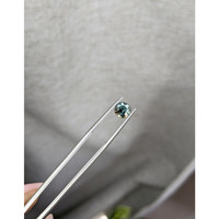 1.52 Ct. Bluish Green Sapphire from Madagascar Life Style