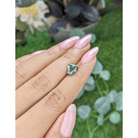 2.04 Ct. Yellowish Green Sapphire from Madagascar Life Style