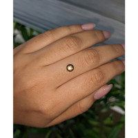 0.75 Ct. Brownish Green Star Sapphire from Ceylon (Sri Lanka) Life Style