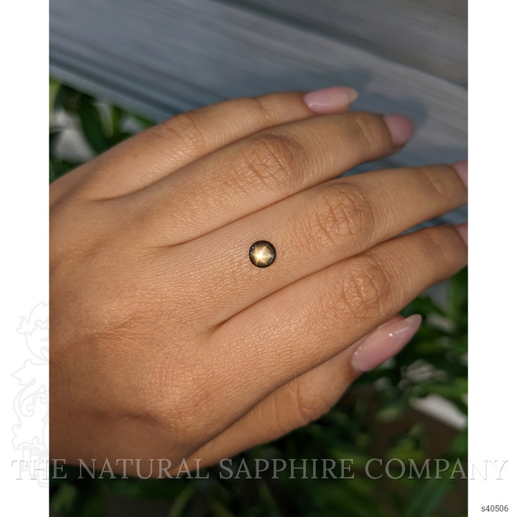 0.75 Ct. Brownish Green Star Sapphire from Ceylon (Sri Lanka)