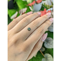 0.75 Ct. Brownish Green Star Sapphire from Ceylon (Sri Lanka) Life Style