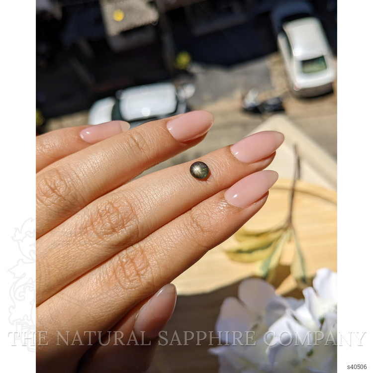 0.75 Ct. Brownish Green Star Sapphire from Ceylon (Sri Lanka)