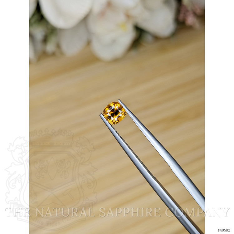 0.78 Ct. Orangish Yellow Sapphire from Ceylon (Sri Lanka)