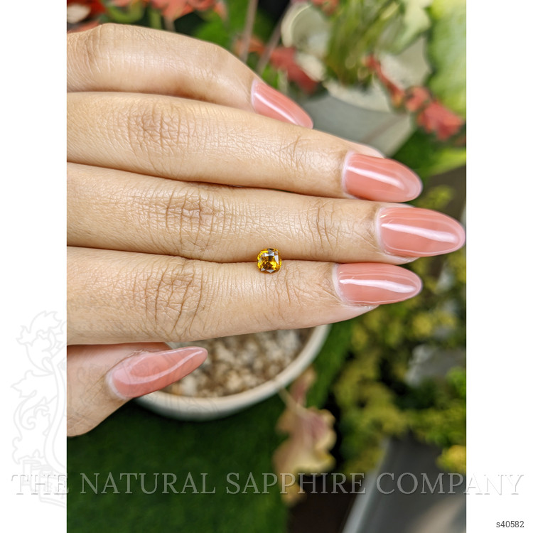 0.78 Ct. Orangish Yellow Sapphire from Ceylon (Sri Lanka)