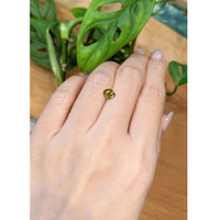 1.10 Ct. Yellowish Green Sapphire from Thailand Life Style