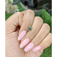 1.19 Ct. Yellowish Green Sapphire from Madagascar Life Style