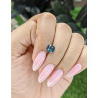1.20 Ct. Bluish Green Sapphire from Madagascar Life Style