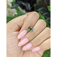 2.00 Ct. Yellowish Green Sapphire from Madagascar Life Style