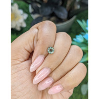 1.02 Ct. Yellowish Green Sapphire from Madagascar Life Style