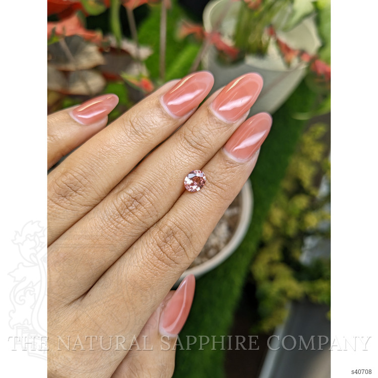 0.91 Ct. Padparadscha Sapphire from Ceylon (Sri Lanka)