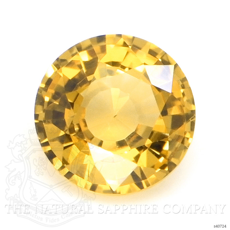 0.70 Ct. Orangish Yellow Sapphire from Ceylon (Sri Lanka)