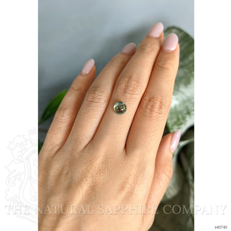 2.12 Ct. Yellowish Green Cabochon Sapphire from Montana