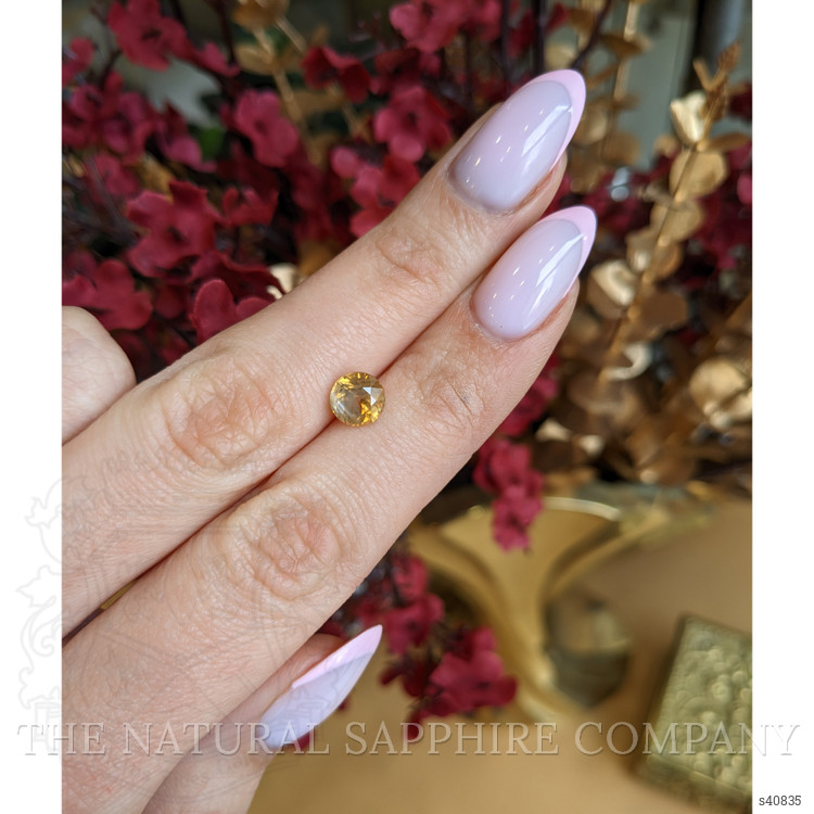 1.95 Ct. Orangish Yellow Sapphire from Montana