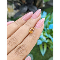 1.00 Ct. Yellowish Orange Sapphire from Tanzania Life Style