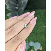0.69 Ct. Yellowish Green Sapphire from Madagascar Life Style