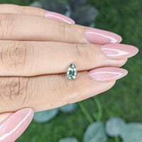 0.69 Ct. Yellowish Green Sapphire from Madagascar Life Style