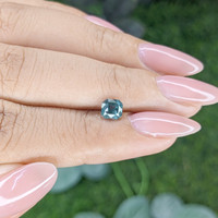 0.81 Ct. Bluish Green Sapphire from Madagascar Life Style