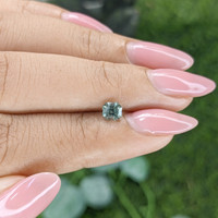0.61 Ct. Bluish Green Sapphire from Madagascar Life Style