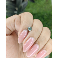 0.61 Ct. Bluish Green Sapphire from Madagascar Life Style