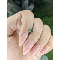 0.74 Ct. Bluish Green Sapphire from Madagascar Life Style