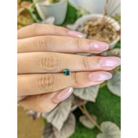 0.83 Ct. Bluish Green Sapphire from Madagascar Life Style