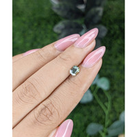 0.76 Ct. Bluish Green Sapphire from Madagascar Life Style