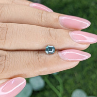 0.54 Ct. Greenish Blue Sapphire from Madagascar Life Style