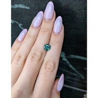 2.31 Ct. Bluish Green Sapphire from Madagascar Life Style