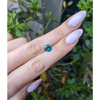 2.26 Ct. Bluish Green Sapphire from Madagascar Life Style