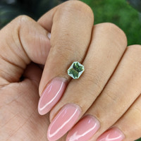 1.17 Ct. Yellowish Green Sapphire from Madagascar Life Style