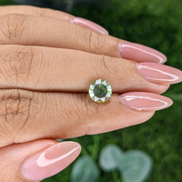 2.18 Ct. Yellowish Green Sapphire from Madagascar Life Style