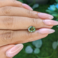 1.49 Ct. Yellowish Green Sapphire from Madagascar Life Style