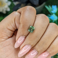 1.36 Ct. Yellowish Green Sapphire from Madagascar Life Style