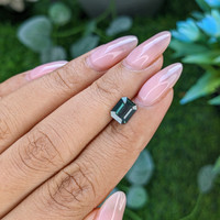 1.57 Ct. Bluish Green Sapphire from Madagascar Life Style