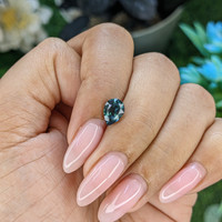 1.52 Ct. Bluish Green Sapphire from Madagascar Life Style