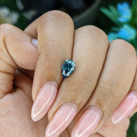 1.07 Ct. Bluish Green Sapphire from Madagascar Life Style