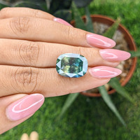 16.30 Ct. Bluish Green Sapphire from Madagascar Life Style