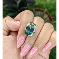 16.30 Ct. Bluish Green Sapphire from Madagascar Life Style
