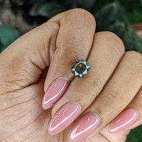 3.01 Ct. Yellowish Green Sapphire from Madagascar Life Style