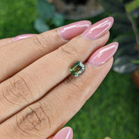 1.01 Ct. Yellowish Green Sapphire from Madagascar Life Style