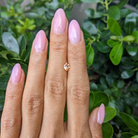 0.54 Ct. Peach Sapphire from Ceylon (Sri Lanka) Life Style