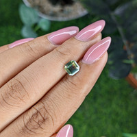 1.05 Ct. Yellowish Green Sapphire from Madagascar Life Style